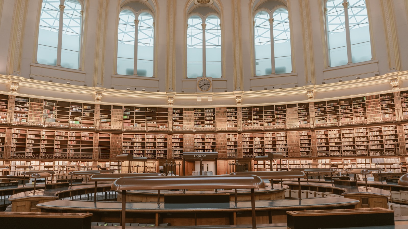 The British Museum Reading Room — concentric stacks under a tall arcade, an institution organised at scale.
