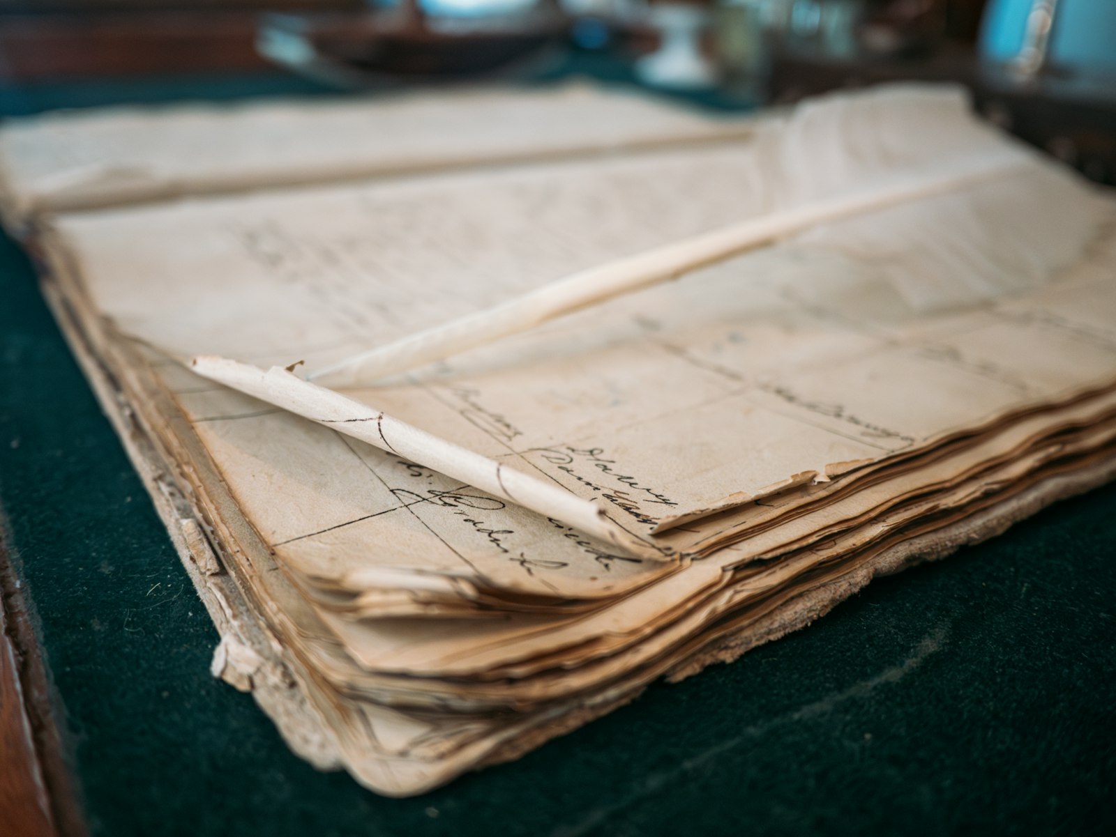 A well-thumbed, hand-ruled ledger — the register at the centre of a school's careful accounting.